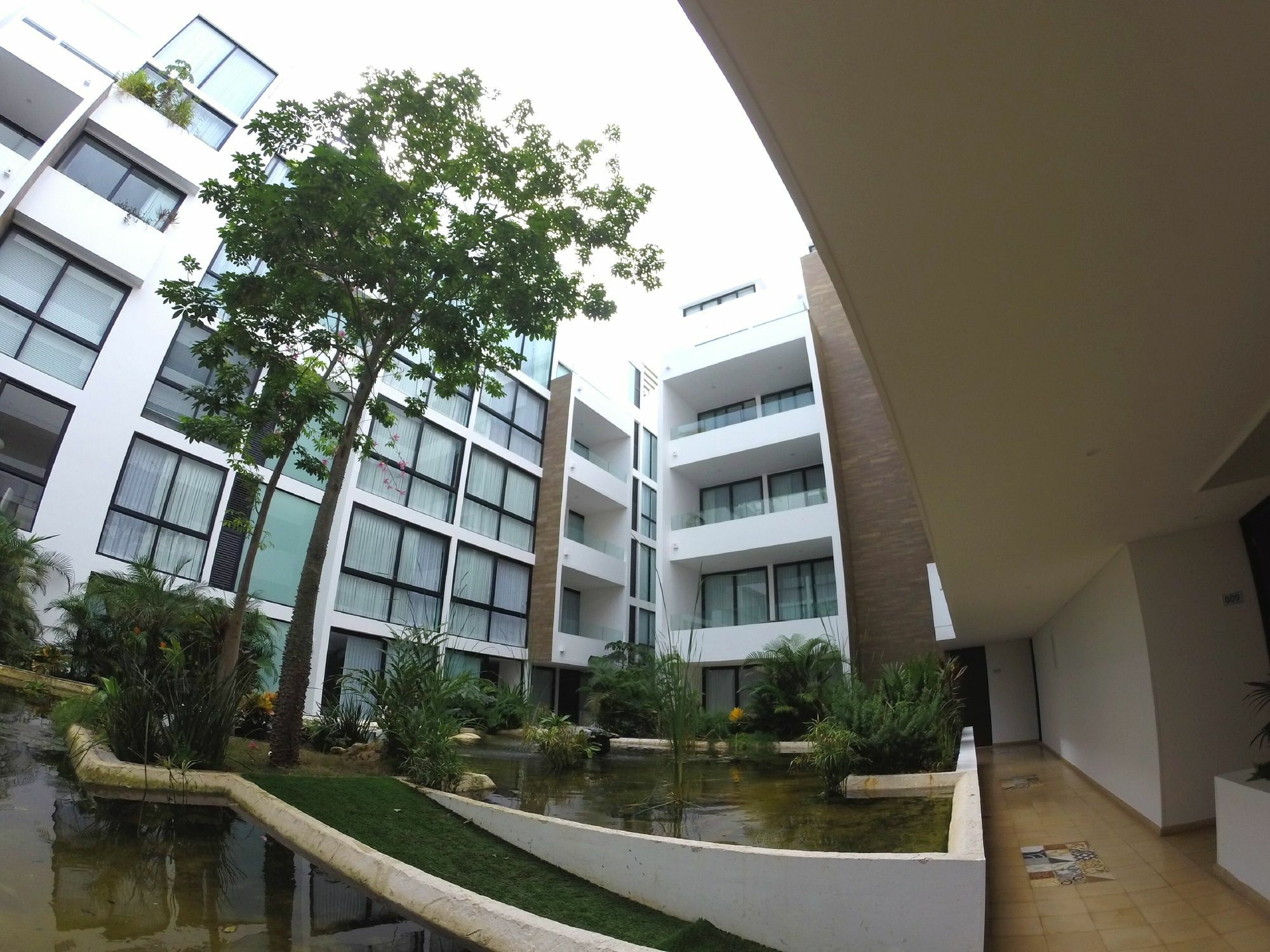 Anah Luxury Condos By Baitna Плая дел Кармен Екстериор снимка